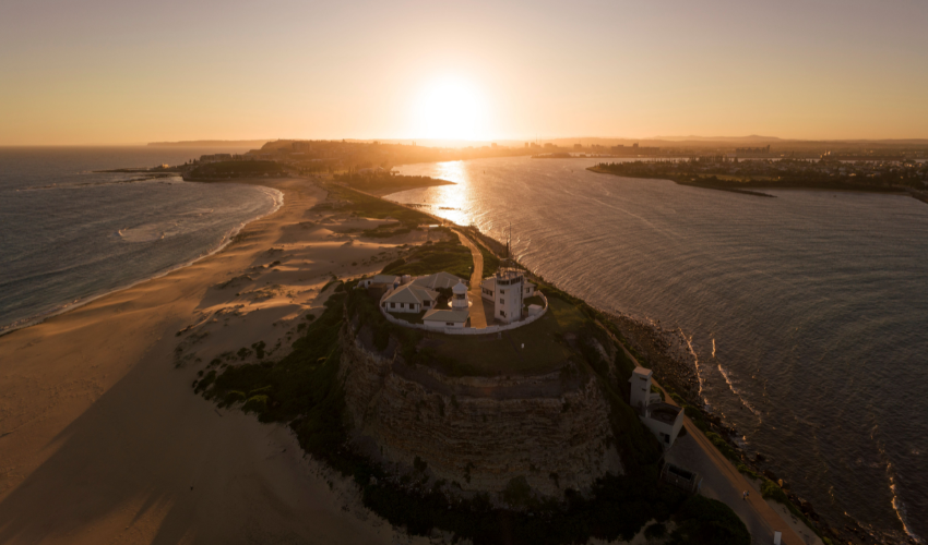 Nobbys Beach and Lighthouse © Destination NSW