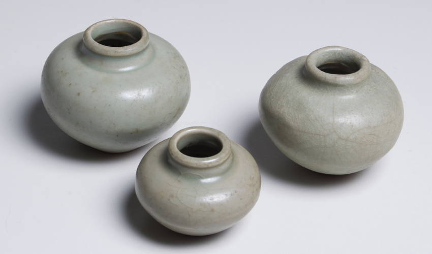 Three celadon glazed bowls originating from China, dated between 960 - 1368