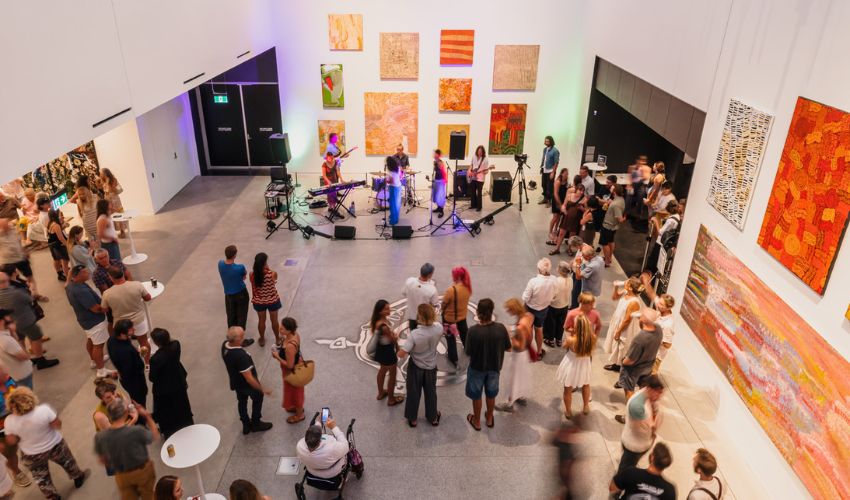 Visitors viewing contemporary artworks inside Newcastle Art Gallery exhibition space