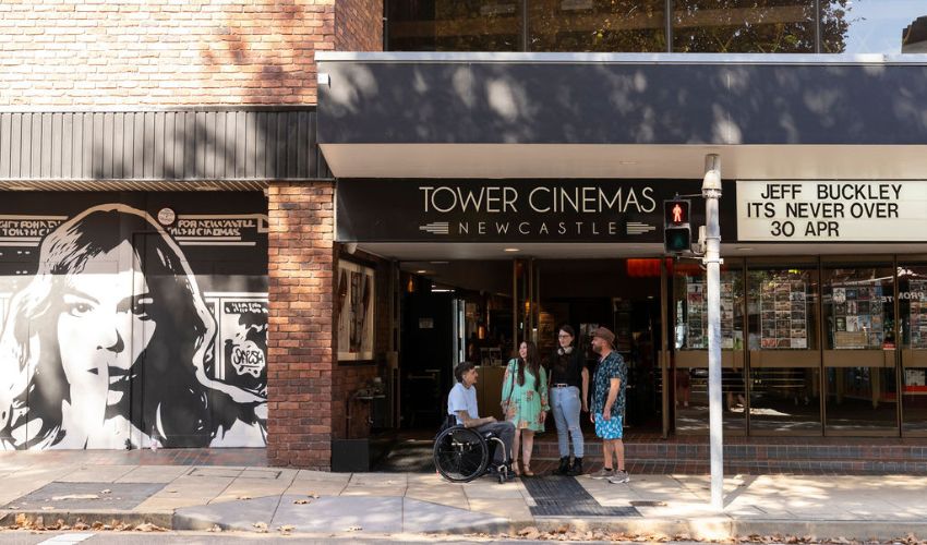 Group of friends standing outside Tower Cinemas in Newcastle city centre