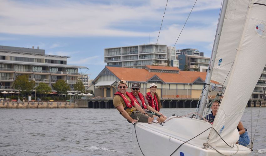 A group learn to sail on Newcastle Harbour with Newcastle Cruising Yacht Club
