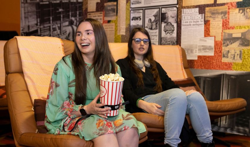 Friends with access needs enjoying themselves at Tower Cinemas